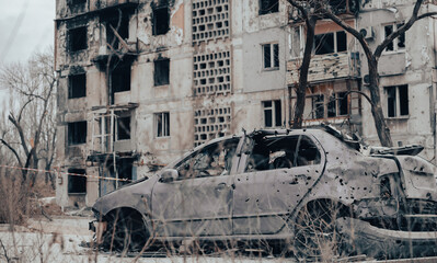 damaged and looted cars in a city in Ukraine during the war