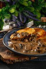 Crispy potato pancakes with mushroom sauce