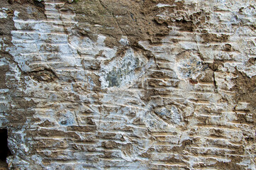 stone wall of abandoned house,background