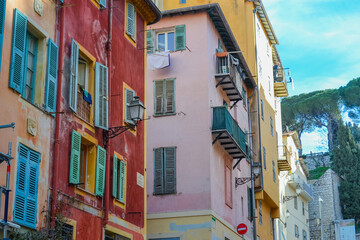 Nice, France, 02/13/2024: The architecture of the old town in Nice boasts a blend of Italian style with French motifs, characterized by colorful houses and narrow streets.