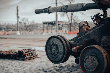 damaged military tank on a city street in Ukraine