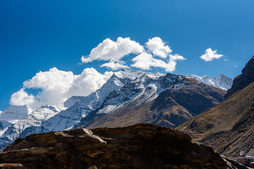 Fototapeta premium Snow mountains of Himalaya with blue sky and clouds