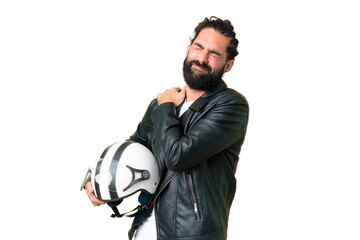 Young man with beard with a motorcycle helmet over isolated chroma key background suffering from...