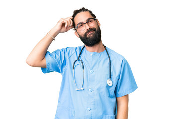 Young doctor man over isolated chroma key background having doubts and with confuse face expression