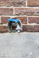 outdoor facet, Outdoor Tap Faucet in Brick Wall 