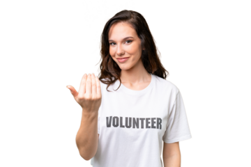 Young volunteer caucasian woman over isolated background inviting to come with hand. Happy that you came