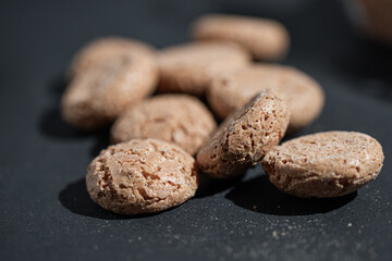 sweet almond cookies biscuits (amaretti),Delicious portrait of a pile of tasty traditional Dutch snacks called pepernoten or peper nuts
