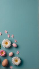 Easter eggs and flowers on blue background 