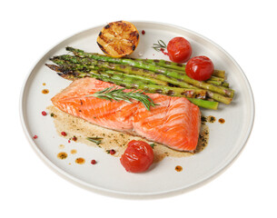 Tasty grilled salmon with tomatoes, asparagus and spices isolated on white