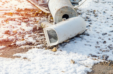 Damaged surveillance camera on the ground as a concept of failing policy of total surveillance....