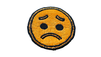 yellow Sad Emoticon symbol embroidered badge isolated on transparent background