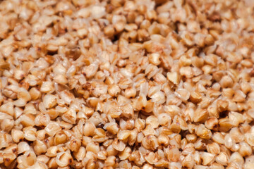 Boiled buckwheat. Buckwheat porridge texture. Natural healthy food, vegan diet.