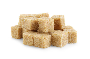 Many brown sugar cubes isolated on white