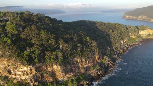 Aerial drone flypast of Lion Island on Hawkesbury River in Broken Bay on the Central Coast of New South Wales, Australia 