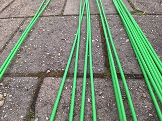 Fibre optic cables ready on the pavement to be buried for high-speed internet