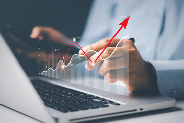 Businesswoman pointing virtual technical graph, chart for analysis stock market, technology...