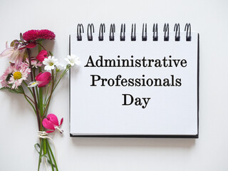 Happy Administrative Professionals Day. Notepad with congratulatory inscriptions. Close-up. Finance and business concept. Congratulations for family, relatives, loved ones, friends and colleagues