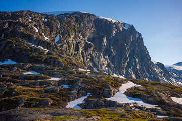 Fototapeta na wymiar The snow capped Breiddalen Valley at Jotunheimen National Park in Norway,