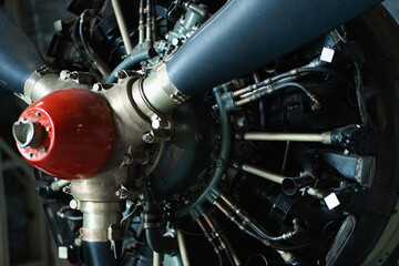 Old engine mechanic details of vintage propeller plane, closeup motor view