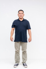 Full-body portrait of a confident middle-aged Asian man standing casually against a white background, looking at the camera.