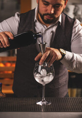 Barman making an alcoholic drink