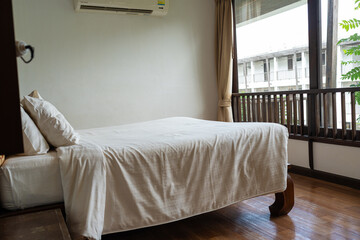 Cozy clean bedroom in tropical resort villa luxury hotel
