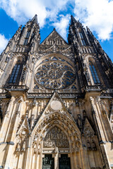 Fototapeta premium Gothic Majesty: Saint Vitus Cathedral Against Blue Sky