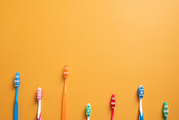 Colorful toothbrush background.  Dental health, care, hygiene awareness.
