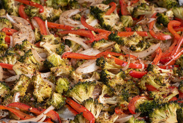 Pan roasted broccoli, red bell peppers, and onions with fresh cracked pepper, olive oil, and garlic.