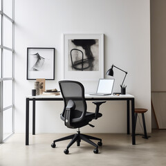 Elegant workspace with modern black office chair and artistic wall decor