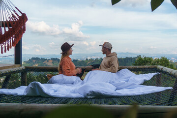 Couple in sitting on a katamaran