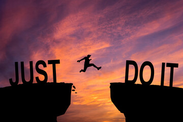 Man jumping on I can do it or I can't do it text over cliff on sunset background, Business concept idea. - obrazy, fototapety, plakaty