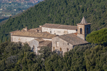 Fototapeta na wymiar the ancient Benedictine abbey of Sassovivo , Foligno , italy medieval construction of the 11th century , view from the mountain 