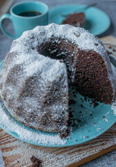 Chocolate bundt cake or gugelhupf with hazelnuts and eggnog
