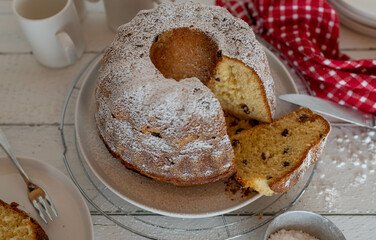 Yeast Gugelhupf or bundt cake  with raisins. Traditional german sponge cake