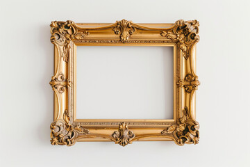 Vintage gold frame hanging on white wall. Golden frame for mock up.