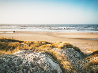 View from a sand dune onto the beach and the sea on the Danish coast of Henne Strand, Denmark