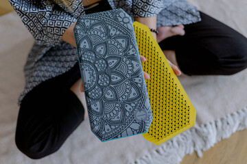 Sadhu board for meditation in female hands. Holiday gift. A tool for rest and relaxation.