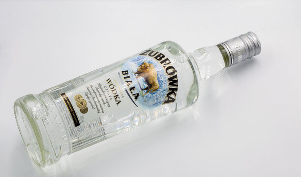 Zubrowka Biala vodka bottle closeup against white.