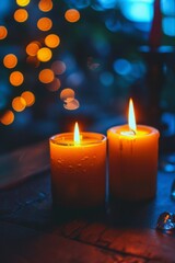 Obraz na płótnie Canvas Cozy atmosphere captured in this image of two lit candles with a soft, warm glow against a blurred festive background.