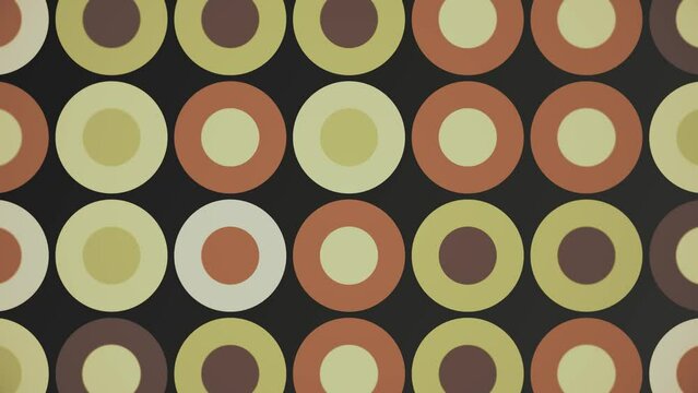 Trendy retro 1970s geometric background with colorful blinking circles in vintage colors - brown, beige and green. This stylish motion background animation is 4K and a seamless loop.