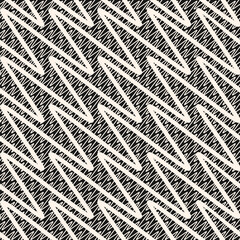 Vector zigzag seamless pattern. Stylish monochrome texture with diagonal zig zag, waves, scribble lines, stripes, chevron. Simple black and white abstract geometric background. Repeated modern design