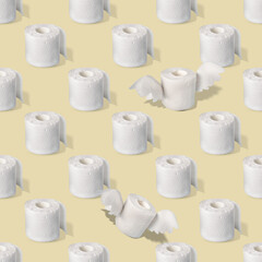 roll of white perforated toilet paper with wings on yellow , seamless pattern