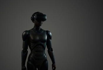 A dark robot wears a VR headset and stands in front of a dark background.