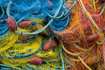 Colourful fishing nets with red buoys