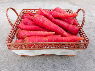 Carrot Vegetable. Fresh and Large Red Carrots in the Basket