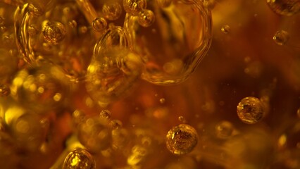 Freeze Motion Shot of Whiskey Liquid Pouring, Macro, Unique Angle of View from the Bottom of the Glass