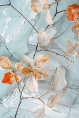 pastel leaves and flowers with silver and gold kintsugi patterns on a branch