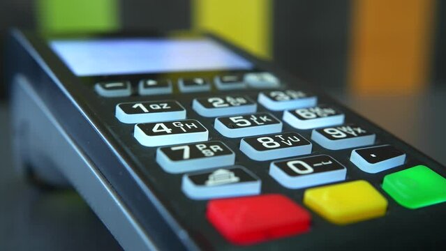 NFC transaction using POS device. POS payment with digital wallet. Contactless payment via contactless credit card