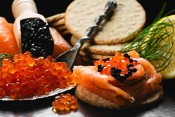 Black and Red Caviar with Smoked Salmon on Scottish Rough Oatcakes. 